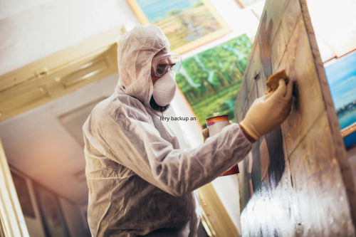 Wall being treated with waterproofing application