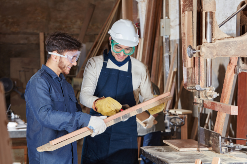 Skilled carpenter working on custom woodwork for furniture and interior design