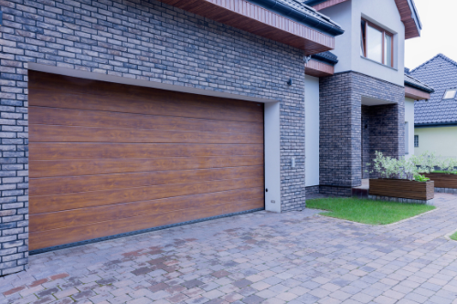 Shutter garage door painting providing a fresh, durable finish to enhance appearance and protect against wear