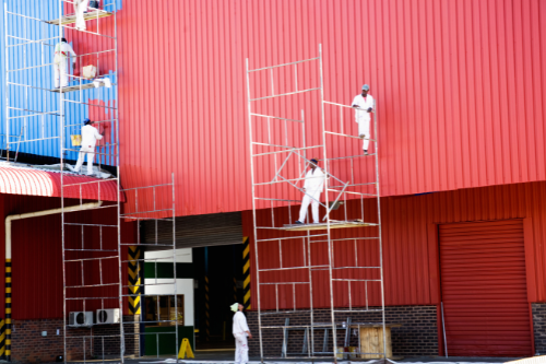 Factory warehouse painting with durable, high-quality finishes to withstand heavy traffic and industrial environments